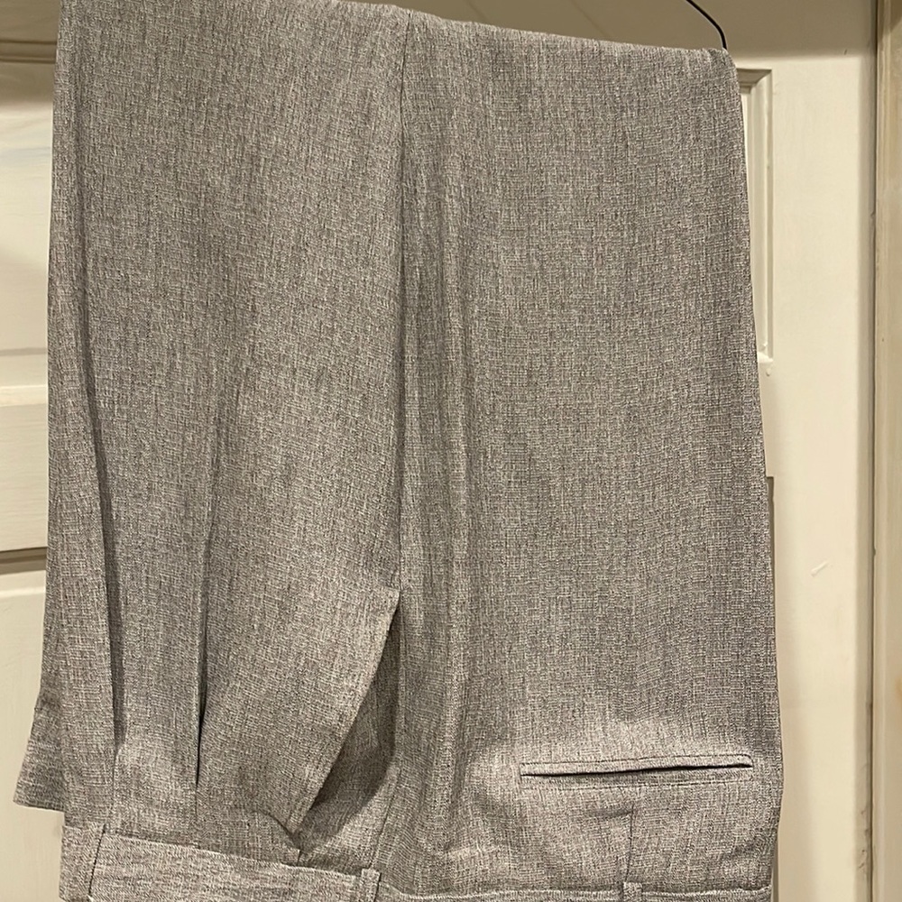 Men two piece outfit. Grey colored 100% polyester. Top Size 3XL pants 48W X 34L.
